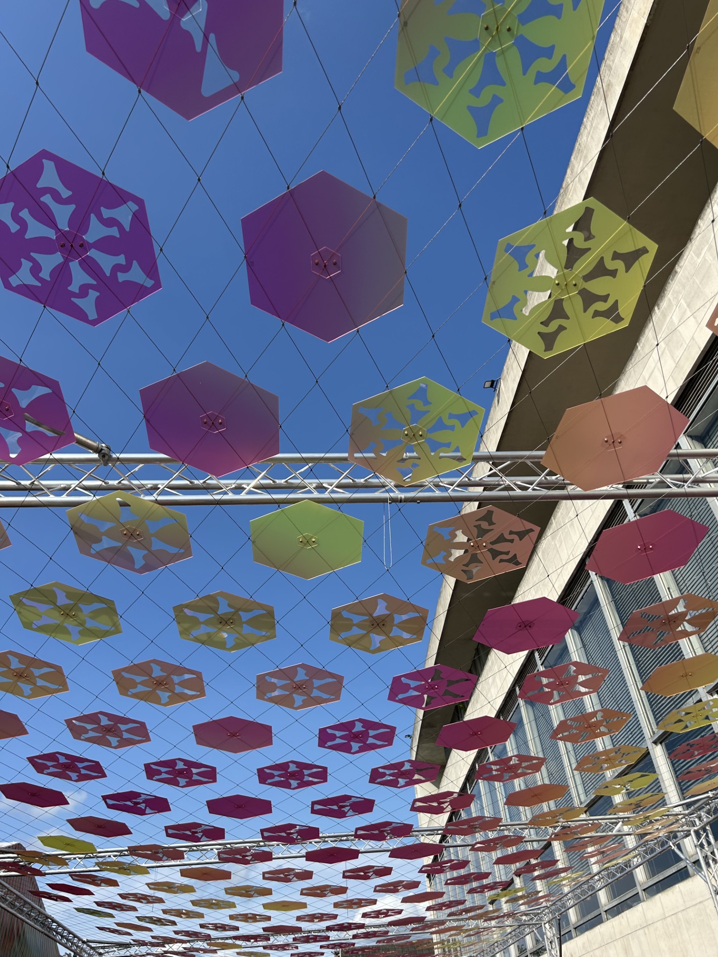 Polycarbonate hexagons suspended over a walk way at London's Southbank