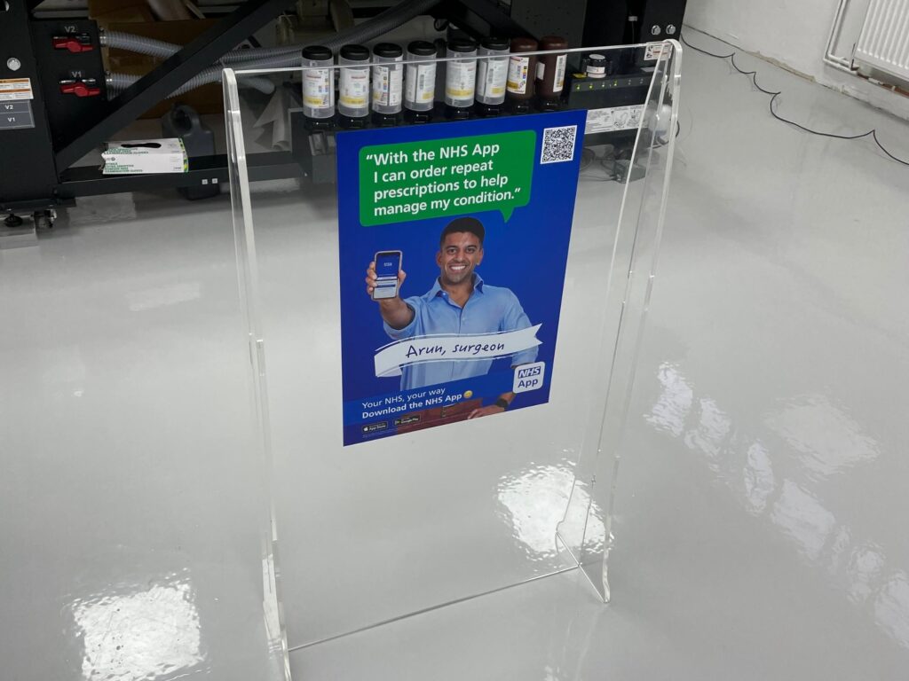 NHS poster printed on to acrylic free standing stand