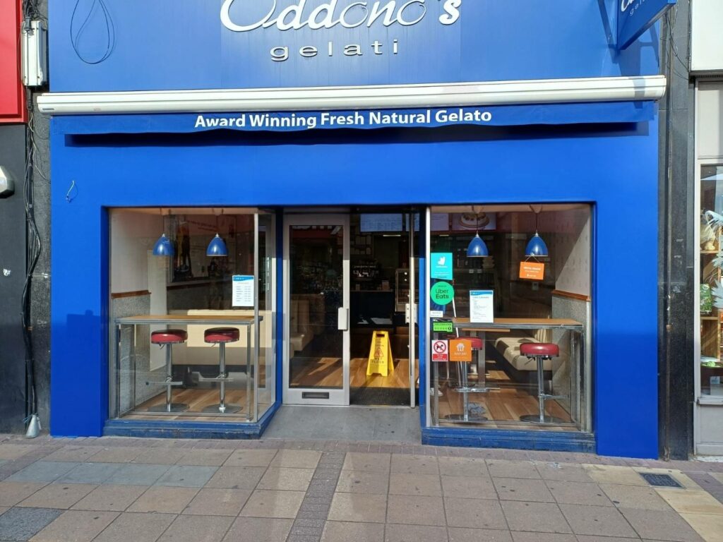 Ice cream shop clad with bright blue sheets we supplied to smarten it up