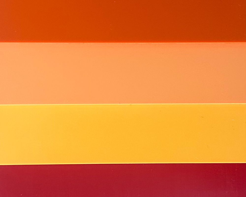 Colour sample of orange, apricot, sunflower and ruby